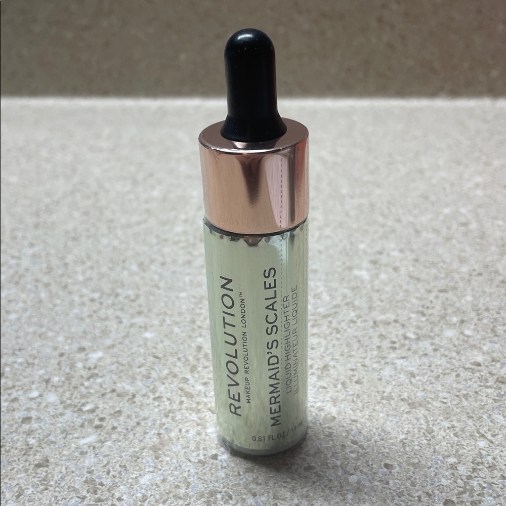 Revolution Mermaid's Scales Highlighter with Rose Gold and Black Accents